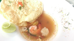 Seafood soup with crispy papadum